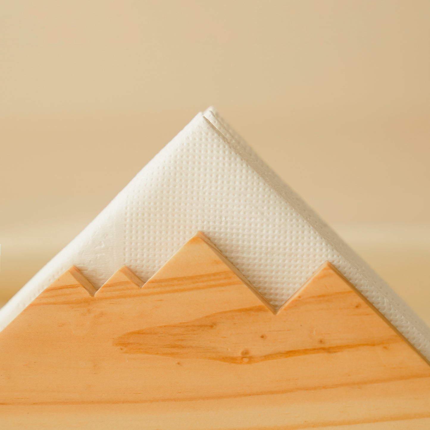 Everest napkin holder solid wood with mountain design holding white napkins by A Good Life