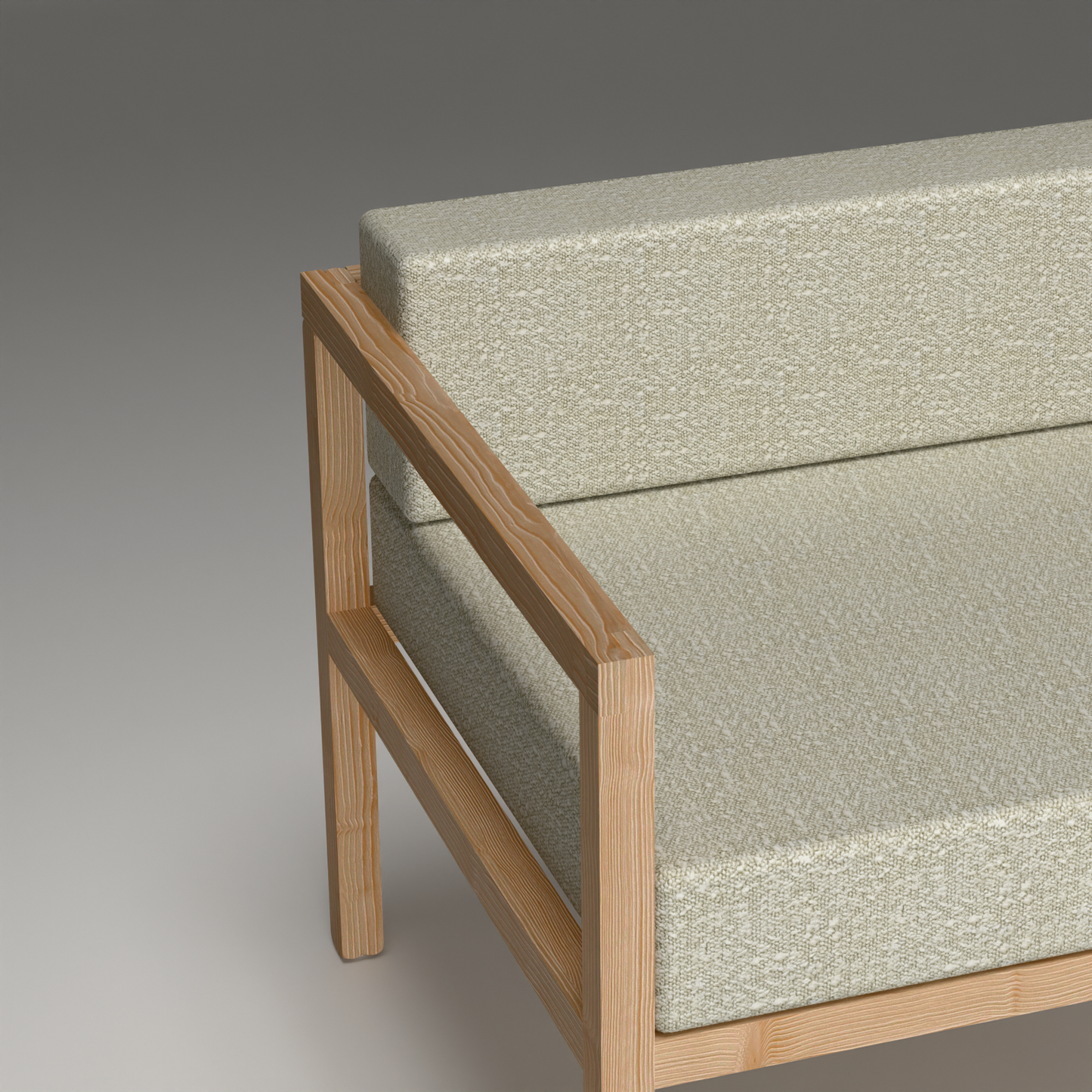 A Good Life minimalist pinewood lounge chair with light textured cushions and natural wood frame