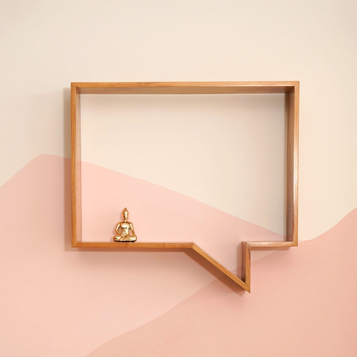 Wooden Wabi-Sabi quote display shelf shaped like a speech bubble with a small golden Buddha figurine