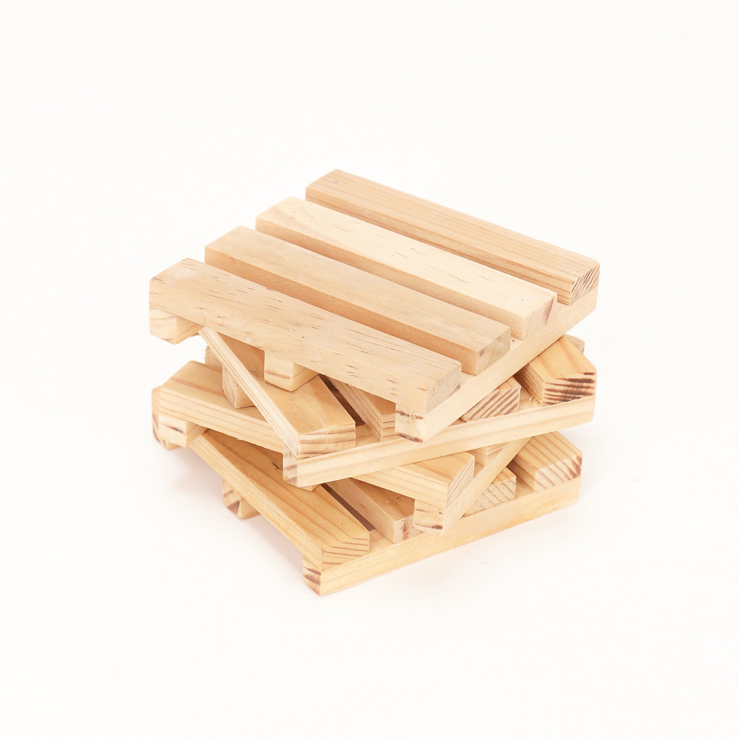 A stack of wooden pallet coasters by A Good Life made from light natural wood with slatted design