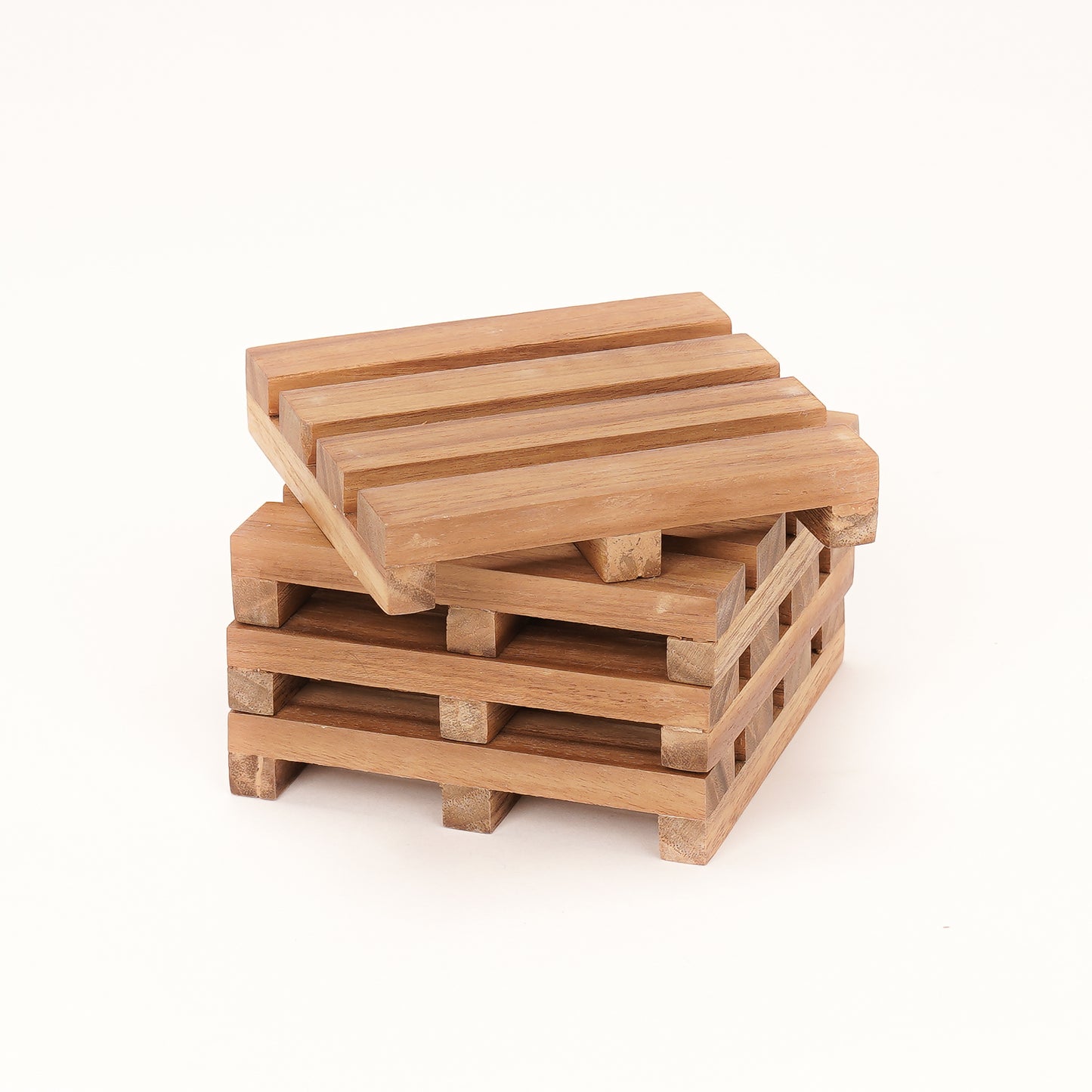 A Good Life wooden pallet coasters stacked on a white background for drink protection