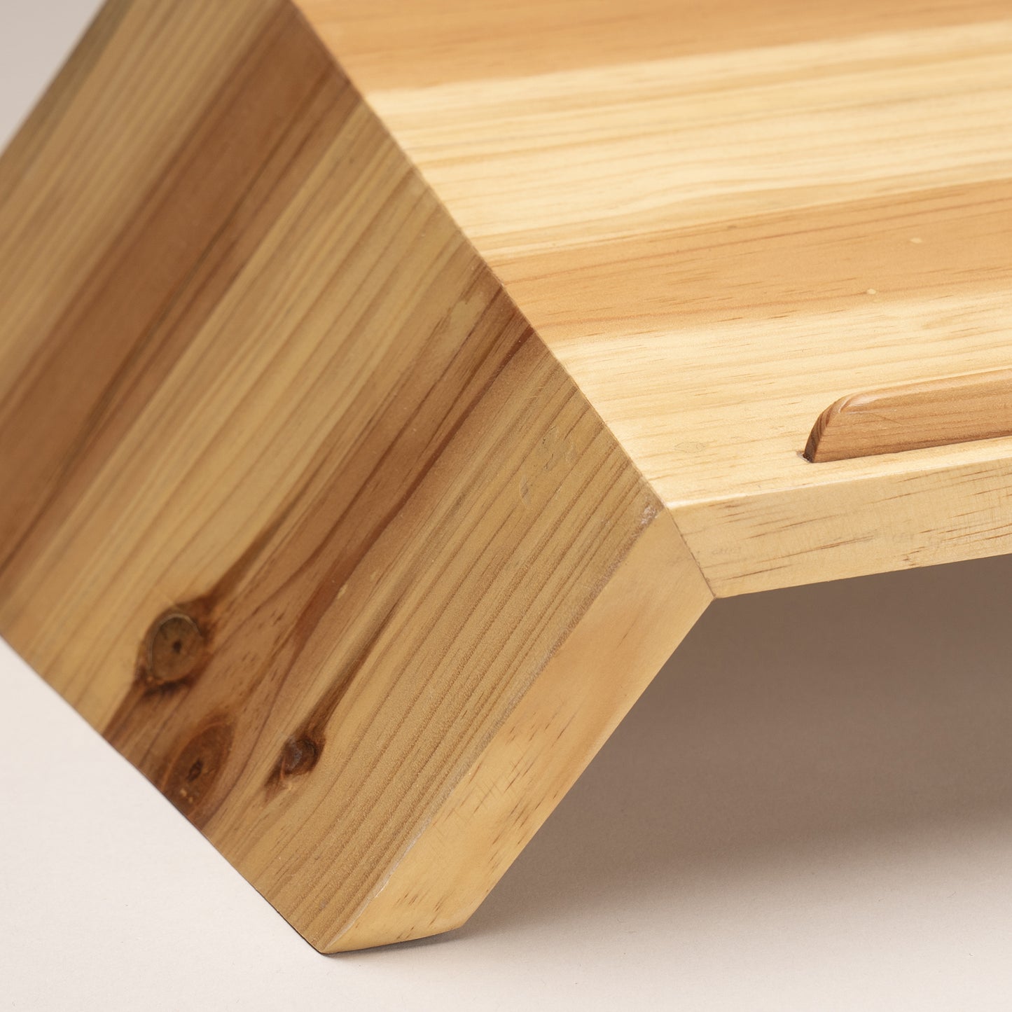 A Good Life wooden minimalist laptop riser for desk with angled design and natural wood grain