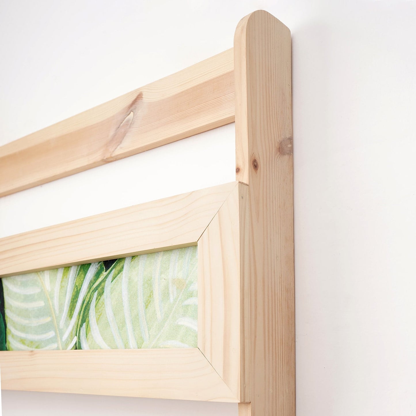 A Good Life Quote Bookshelf made of natural wood featuring a minimalist magazine rack design