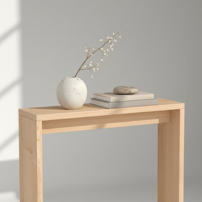 Scandinavian-inspired narrow console table in contemporary entryway with sustainable reclaimed wood construction