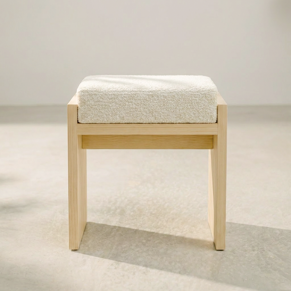 Minimal wooden bouclé stool with clean silhouette