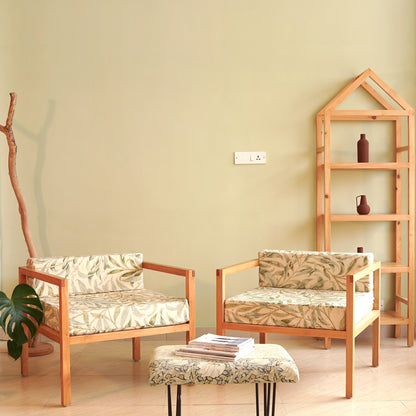 A Good Life minimalist pinewood lounge chair set with floral cushions in a modern living room