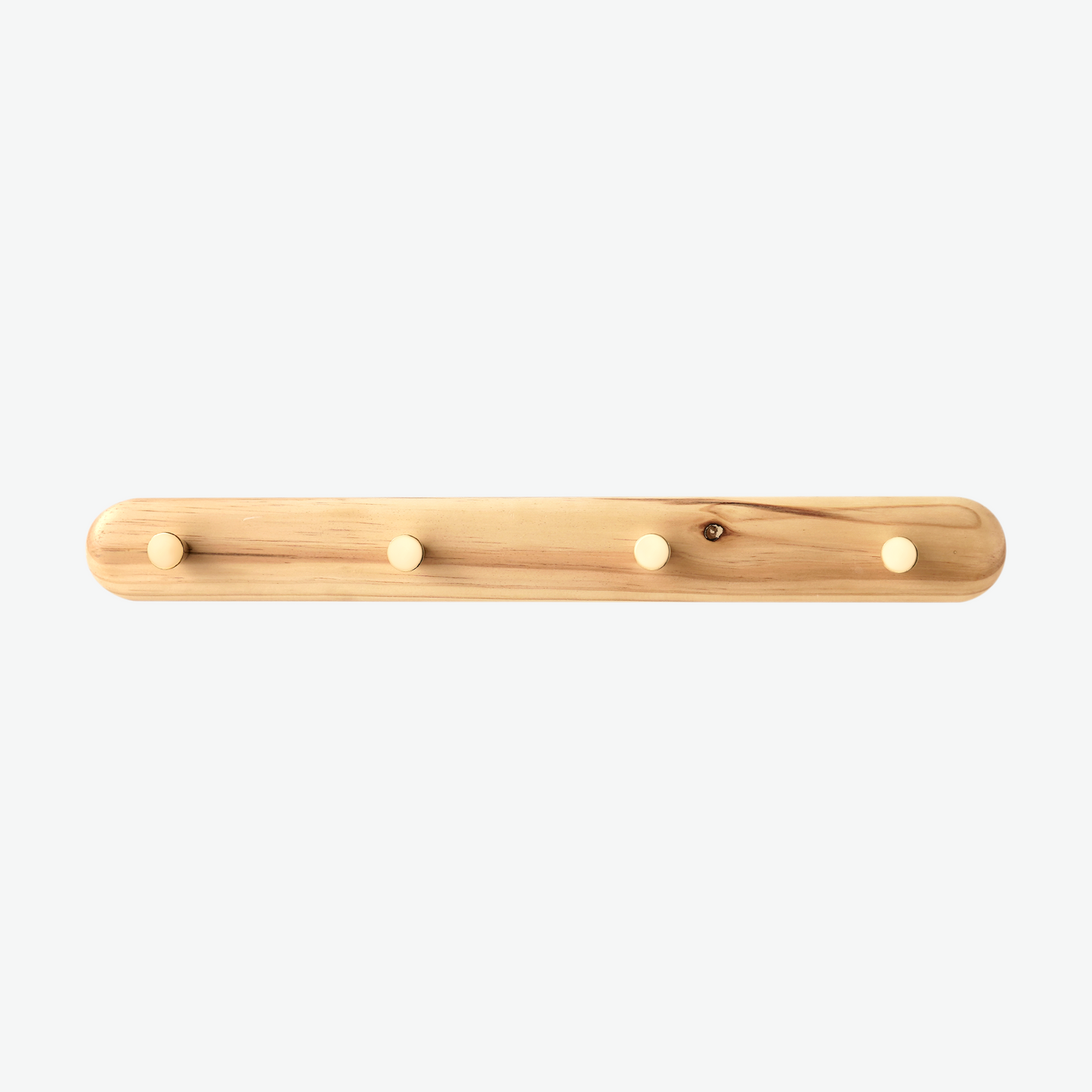 Minimalist wall hanger by A Good Life made of light natural wood with four rounded pegs