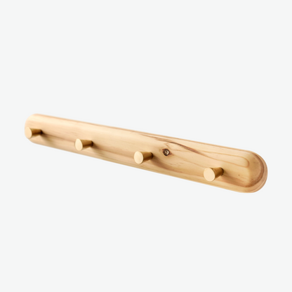 A Good Life minimalist wall hanger made of natural wood with four pegs for organizing