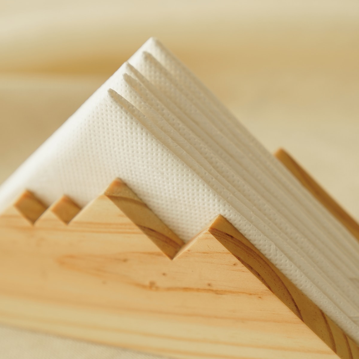 Nordic style wooden napkin stand organizer in reclaimed pinewood for minimalist dining room table accessories