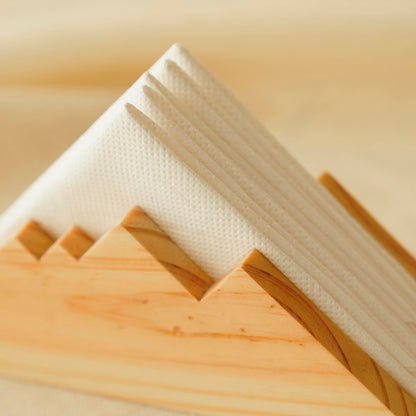 Nordic style wooden napkin stand organizer in reclaimed pinewood for minimalist dining room table accessories