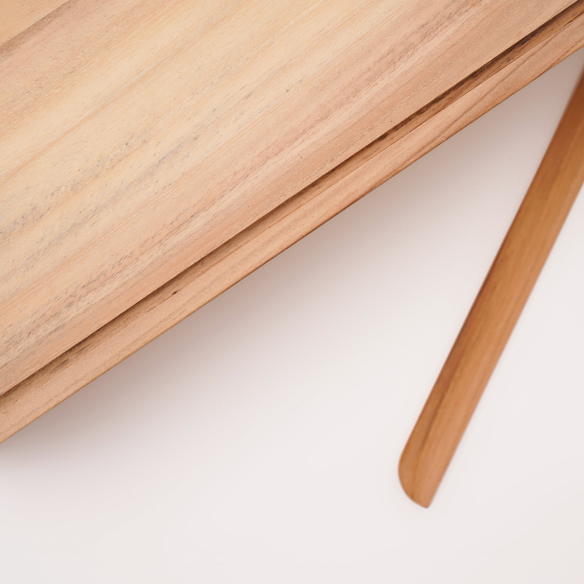 Close-up of A Good Life pinewood ergonomic work desk laptop stand showing natural wood grain and smooth finish