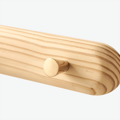 Scandinavian handcrafted wall hanger brass hooks in solid pinewood for Nordic inspired entryway coat rack