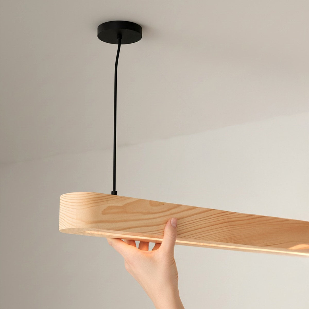 Scandinavian wooden Hikari beam pendant lighting fixture with natural grain for Wabi-Sabi inspired interior design