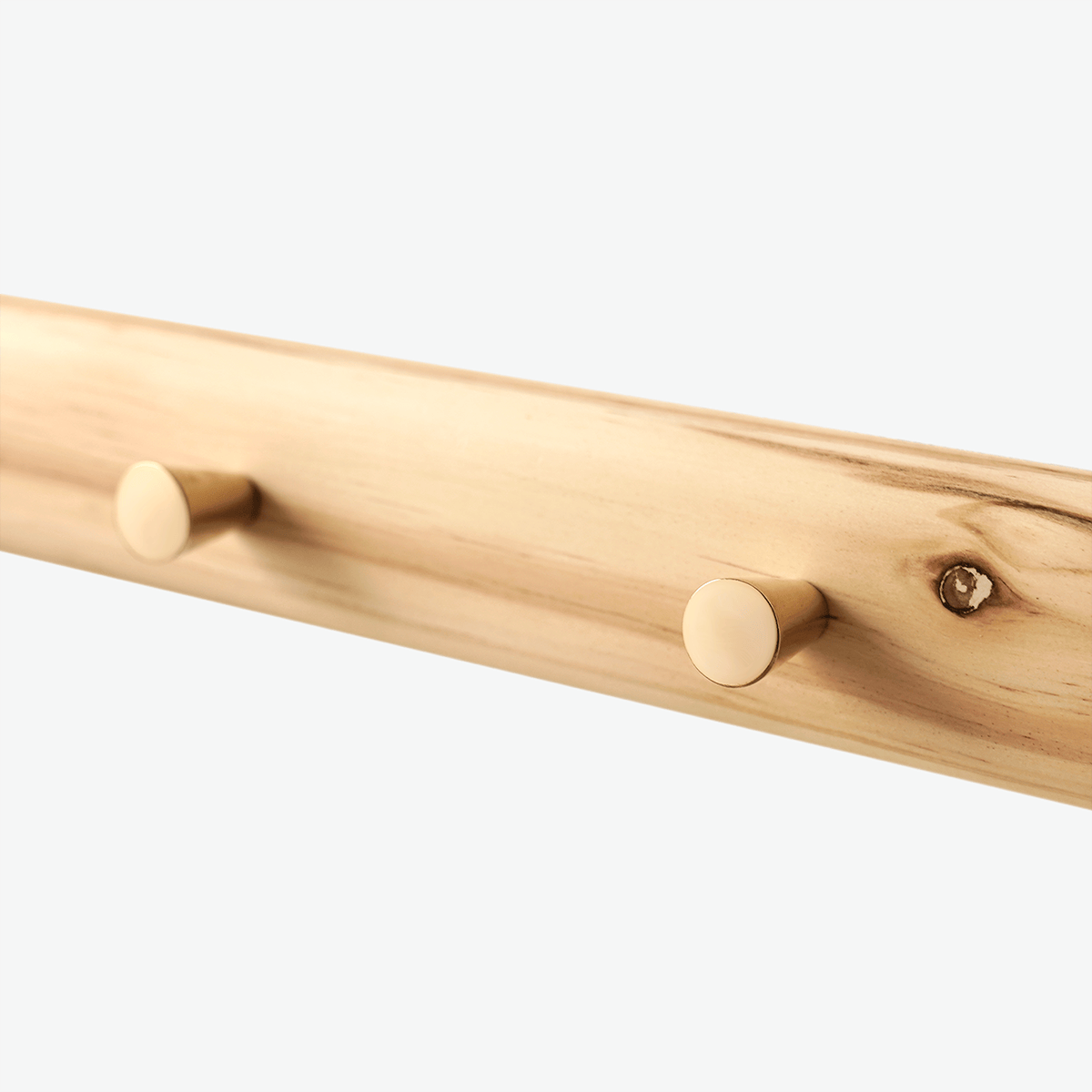Scandinavian wooden wall hanger brass hook rack in natural pinewood for minimalist hallway bedroom organizer