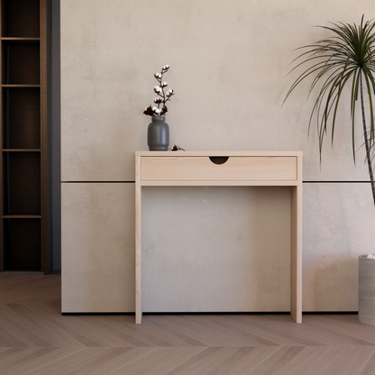 Minimalist pinewood air console with single drawer and decorative vase on top in modern room