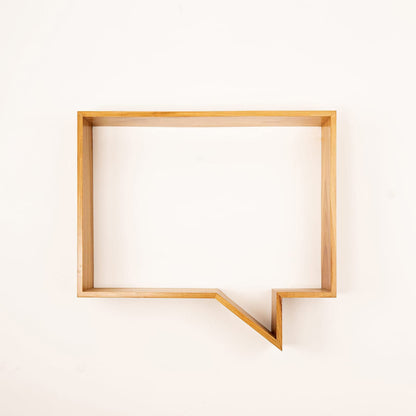 Wabi-Sabi quote display shelf by A Good Life in natural wood shaped like a speech bubble