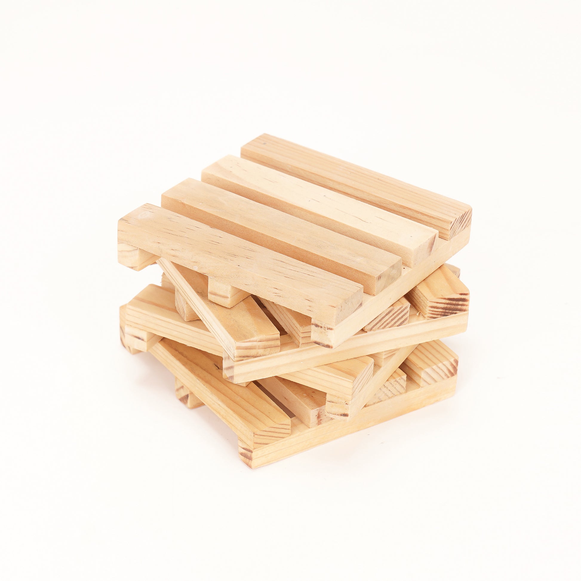 A stack of wooden pallet coasters by A Good Life made from light natural wood with slatted design