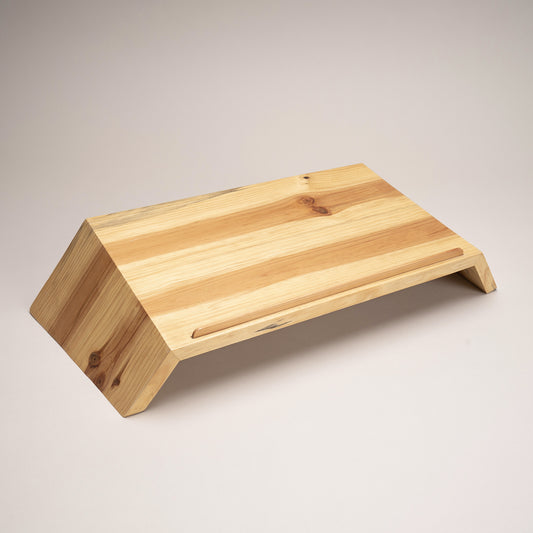 A Good Life minimalist laptop riser for desk made of light natural wood with angled design