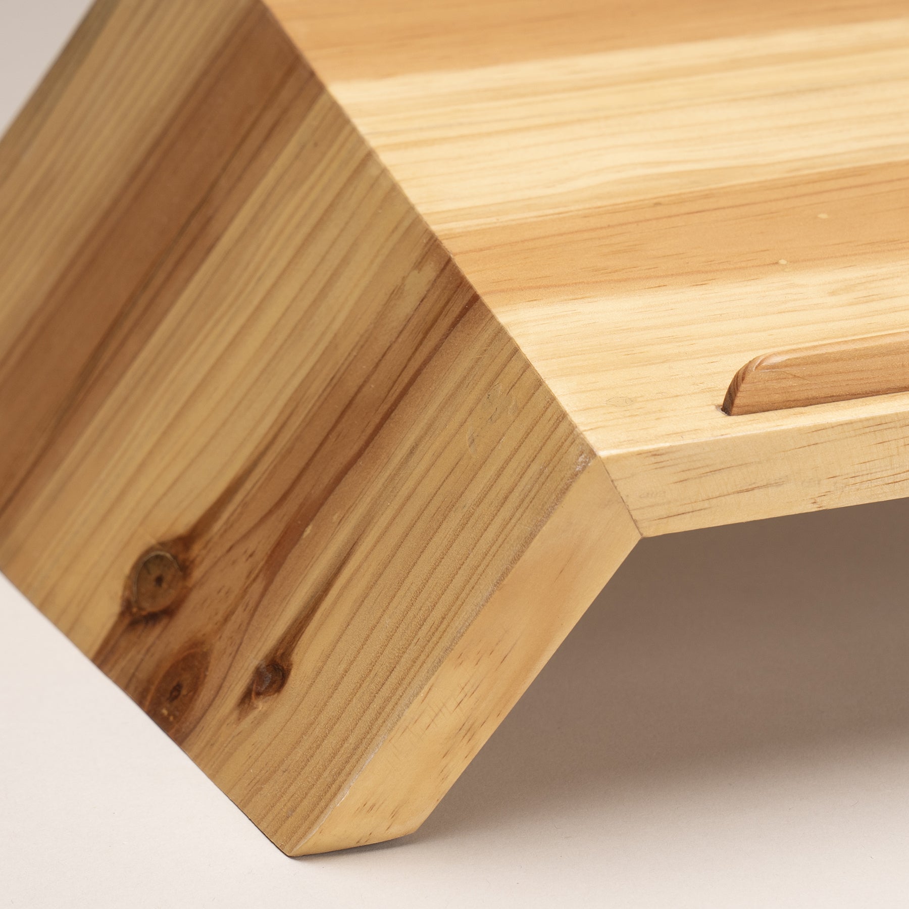 A Good Life wooden minimalist laptop riser for desk with angled design and natural wood grain